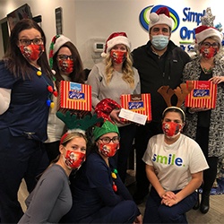 dental staff group photo at christmas time